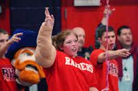 Ryan High School junior Breana Bladel and other members of the Honor Guard sing the Ryan school song at the end of a pep rally.David Minton - DRC