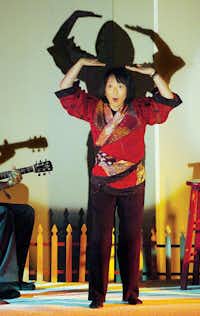 Motoko performs Friday morning during the Texas Storytelling Festival at the Denton Civic Center.Al Key - DRC
