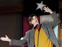 Andy Offutt Irwin performs Friday morning during the Texas Storytelling Festival at the Denton Civic Center.Al Key - DRC