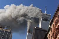 <p><span style="font-size: 1em; background-color: transparent;">On Sept. 11, 2001, smoke rises from the burning Twin Towers of the World Trade Center after hijacked planes crashed into the towers in New York City.</span><br></p>AP file photo