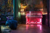 Designer Dio Davies was inspired by Blade Runner and Tron when she created this pink, transparent perspex piano. It has pink neon lights inside and is compatible with wireless iPod devices for self-playing mode. It's also more expensive than some cars, priced at $50,000.Edelweiss Pianos