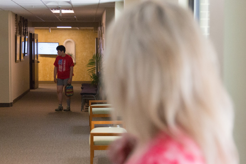 Angela Biggs keeps an eye on her daughter Amber Reynolds during a visit at the Good Samaritan Society. DRC