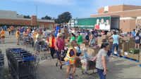 The Denton mobile food pantry attracted a lot of hungry people at its new location at First Baptist Church of Denton. The pantry is open from 9 to 11 a.m. on the second Saturday of each month.Denton Hunger Coalition
