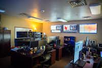 Analysts in the office of the Energy Management Organization at Denton Municipal Electric on Friday monitor screens with various information to help them determine when to buy and sell electricity at the best price. Friday, July 28, 2017, Denton Municipal Electric in Denton, Texas. Jake King/DRC ORG XMIT: txderDRC
