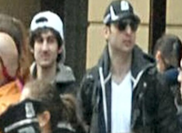 This photo released by the FBI early Friday April 19, 2013, shows what the FBI is calling the suspects together, walking through the crowd in Boston on Monday, April 15, 2013, before the explosions at the Boston Marathon.Uncredited - AP