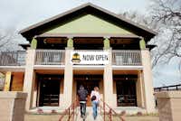 Customers walk into the Treehouse Bar & Grill at 1512 W. Hickory St. on Friday.Al Key - DRC