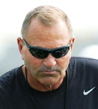 University of North Texas head coach Dan McCarney talks to players during a break at spring football practice, Wednesday, March 28, 2012, at the Darrell R. Dickey Practice Facility in Denton, Texas.David Minton