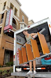 UNT sophomore Camilla Smith moves her belongings in to her new apartment at Sterling Fry Street during move-in day Wednesday August 15, 2012, in Denton.Al Key