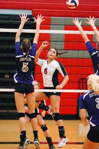Argyle's Sierra James (5) gets one past Denton's Hannah Altman (5) against Denton, Tuesday, August 21, 2012, in Argyle, TX.David Minton