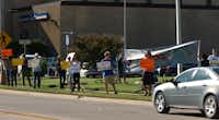 Protestors set up along McKinney St in front of Denton City Hall before a city council meeting where the drilling moratorium in Denton in expected to be extended until December. However, drilling permit applicationsfor several wells that were filed before the moratorium went in to effect, are likely to be approved., Tuesday, September 11, 2012, in Denton, TX.David Minton