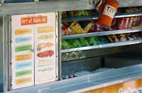 A sign explains what goes into a Banh Mi, a type of sandwich from Vietnam, at the Nammi Truck. Nammi is one of several food trucks that frequent the UNT campus, Wednesday, September 26, 2012, in Denton, TX.David Minton
