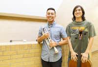 Aldo Alvarado, left and Mason de Leon, who are both majoring in music education at the University of North Texas, have volunteered their time with the North Texas Music Educators Association for the annual Instrument Petting Zoo from 10 a.m. to 1 p.m. Saturday.Photos by Tomas Gonzalez