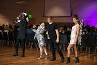From left, Derrel Hall, Hayley Cooper, Grant Mckinley and Brooke Mainord model "Pixelated" fashion during "Digital Glitch" on Sunday night at the UNT Union.Ranjani Groth
- DRC