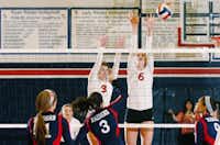Argyle senior Aubrey Kass (3) and junior Katy Keenan (6) jump to try to block from Ryan's Alex Summer (3), Tuesday, August 27, 2013, in Denton.David Minton