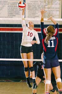 Argyle senior Brooke Robertson (10) gets one over past Ryan's Kodi Pettigrew (11), Tuesday, August 27, 2013, in Denton.David Minton