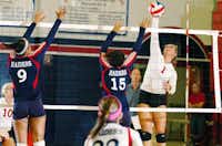 Ryan's Faith Pittman (9) and Shanna Daniels (15) try to block a hit from Argyle sophomore Eighmy Dobbins (1), Tuesday, August 27, 2013, in Denton.David Minton