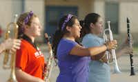 Valeria Ibarra leads her section during band practice at Krum High School Thursday August 1, 2013, in Krum.Al Key - DRC