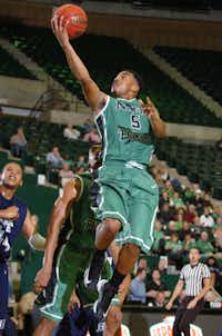 North Texas guard Chris Jones goes to the basket against Jackson State on Saturday at the Super Pit. Jones scored 11 points in the Mean Green’s 83-65 win.DRC/David Minton