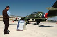 Mark Nelson of Coppell looks at a Messerschmitt at Denton Enterprise Airport on Monday.Al Key - DRC