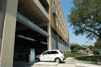 Cars enter the new campus parking garage Thursday, the first day of the fall semester at the University of North Texas.