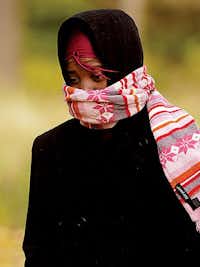 Texas Woman’s University senior Natoshia Hamilton was bundled up as she walked across campus in the cold on Monday.