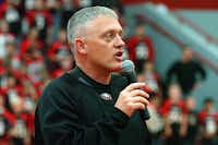 Argyle High School head football coach Todd Rodgers speaks at a pep rally Thursday night at the school.